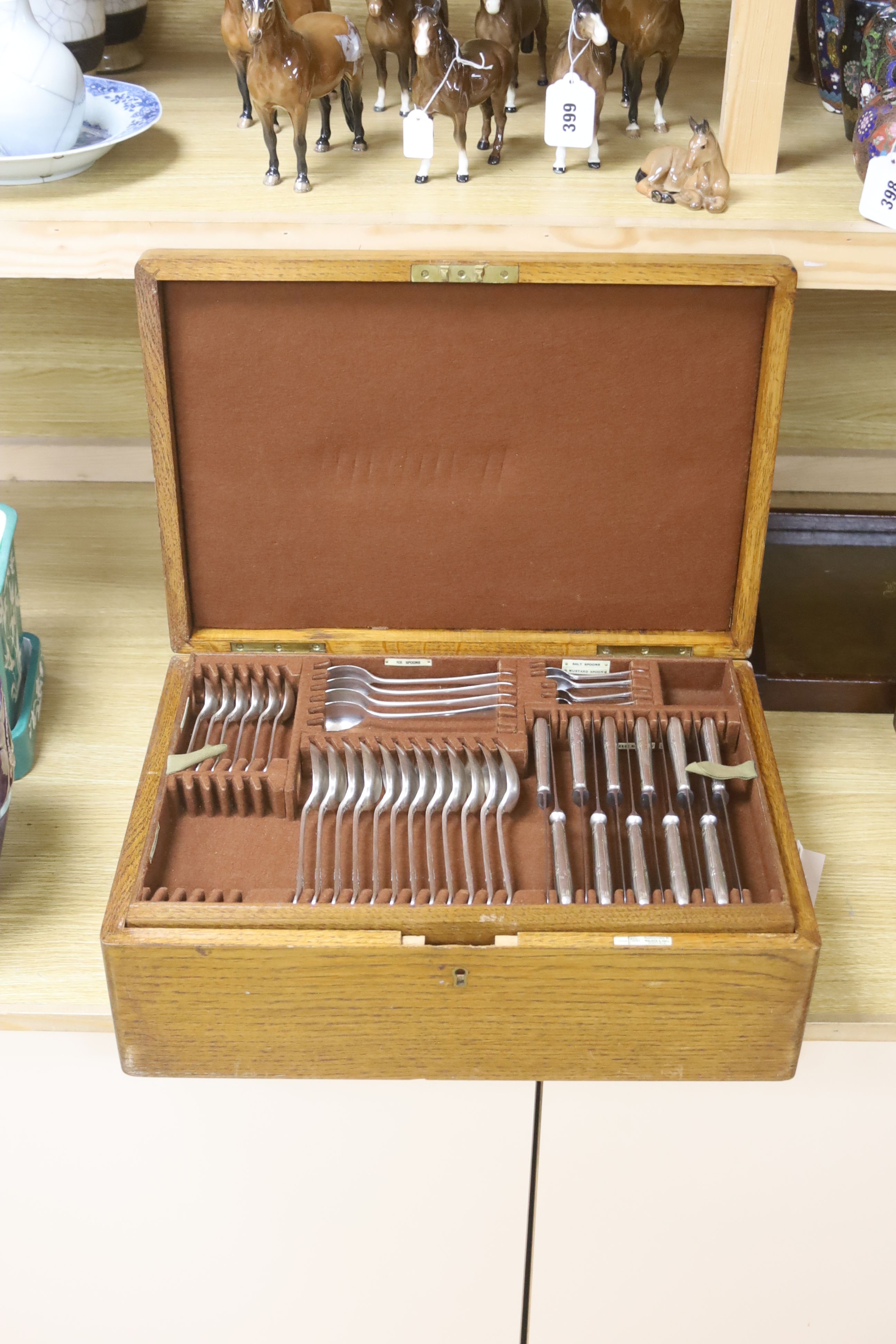 A service of Walker & Hall Laurel pattern plated flatware in oak canteen (100 plus pieces)